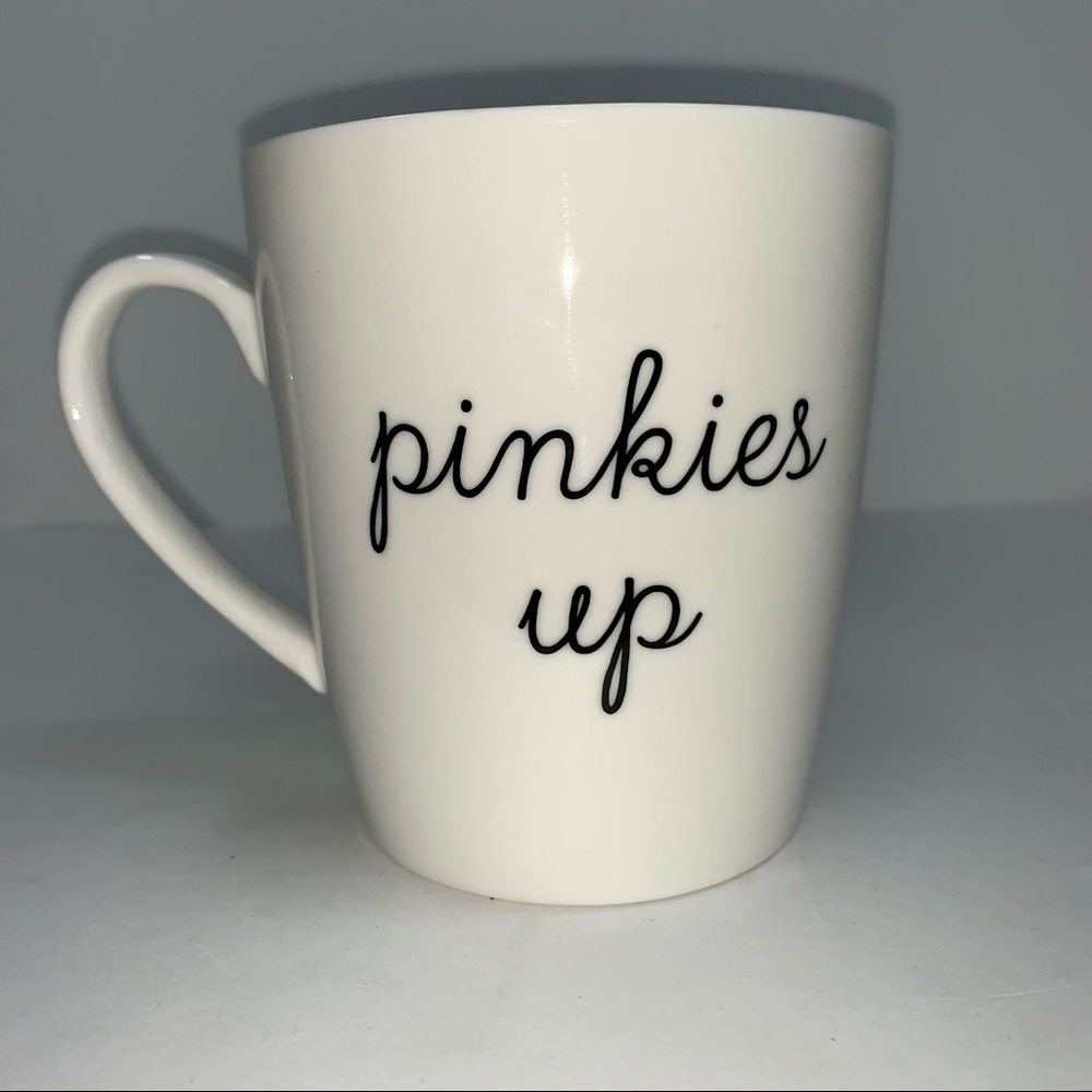 Indigo white mug with black “Pinkies Up” written on both sides.